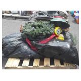 Skid of: Christmas decorations, booster starter,