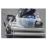 Skid lot with razor scooters, baseball softball