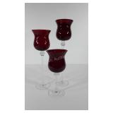 Trio of glass candleholders,  10" to 16"