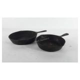 Two cast iron skillets, 8" and 9"