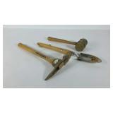 Three gardening tools.