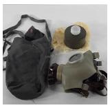 Military items, canvas bag with gas mask and can