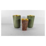 Three Shawnee pottery vases, 8" and 10"