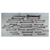 Group of wrenches, mostly combination wrenches,