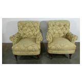 Pair of upholstered arm chairs, wheels on front