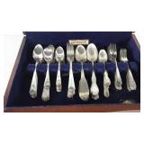 Wooden flatware chest with flatware, chest shows