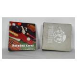 2 binders of baseball cards. One is labled 1991