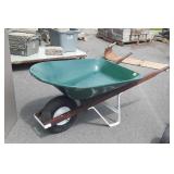 Green metal wheelbarrow