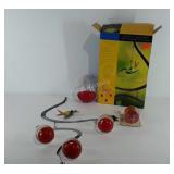 Garden ballet hummingbird feeder mobile, with ant