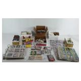 Group of baseball cards, some in packaging, some