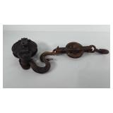 Tools, two cast iron pulleys