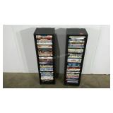 Two DVD/Blu-Ray towers, one Brookstone, one
