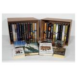 31 John Grisham books. All but two are hardback.