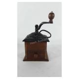 Cast iron and wooden coffee grinder