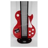 Dale Earnhardt guitar shaped CD tower, 50" tall