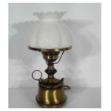 Lamp with metal base and milk glass shade. Stands