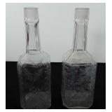 Two glass decanters, missing tops, both include