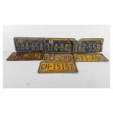 Seven Pennsylvania license plates, three 1958,
