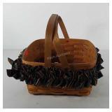 Gerald E. Henn workshops dual handled basket,