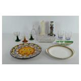 Group of dishes, glass woman bell, plates,