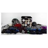 Group of winter accessories, scarves, gloves, and
