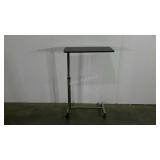 Adjustable tray cart, could be used as a bed