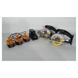 Two Ryobi Circular Saws, charger and 4 batteries.