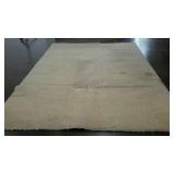 Cream colored shag room rug, 8