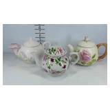 Group of floral teapots , one marked Teleflora