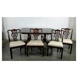 Dining table, four chairs, one captains chair,