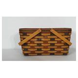 Longaberger basket with hinged handles and poly