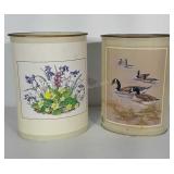 2 metal waste baskets with paper decal designs.