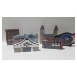 Village collectibles by the cat