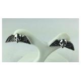 Sterling silver skull and wing stud earrings