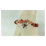 Carnelian chip bracelet 7-8.5in with flower charm