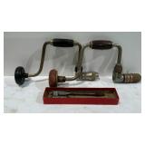 Two drill braces and two bits.