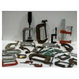Large group of assorted clamps, mostly C-clamps.