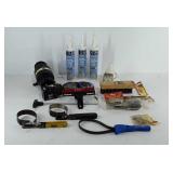 Tools, caulk, grinding discs, wire brush, and