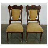 Victorian parlor hip chairs, one has a ripped