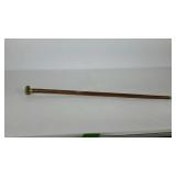Rose wood walking stick with brass tip and grip,