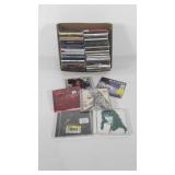 CDs, approximately 50 CDs, artists include Katy