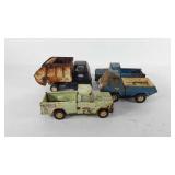 Toys, four metal Tonka trucks, condition as