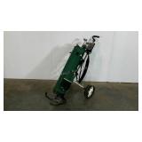 Golf bag cart on wheels, includes clubs as shown,