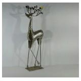 Decorative metal reindeer sculpture, missing one
