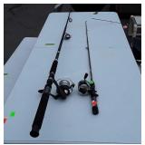 Two Fishing Rods with Reels, note one rod tip