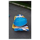 3 Plastic Sleds and 1 Boogie board