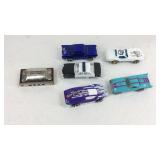 Hotwheels and one corgi toy cars and a M Hohner