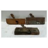 Three older molding planes.