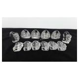 Twelve glass paperweights, includes four nativity