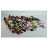 Flat of toy vehicles. Cars, trucks, planes,